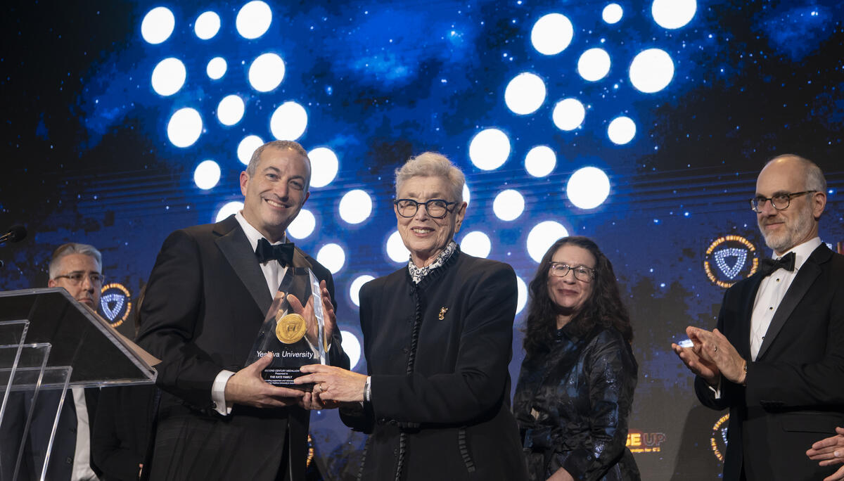 Rabbi Dr. Ari Berman awards the Katz family the Second Century Medallion at the 101st Annual YU Hanukkah Dinner