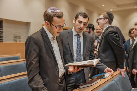 two students praying